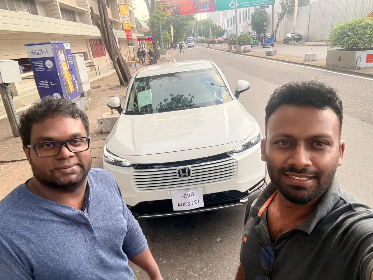 Genuine Automobiles customer with a delivered vehicle, photo 3
