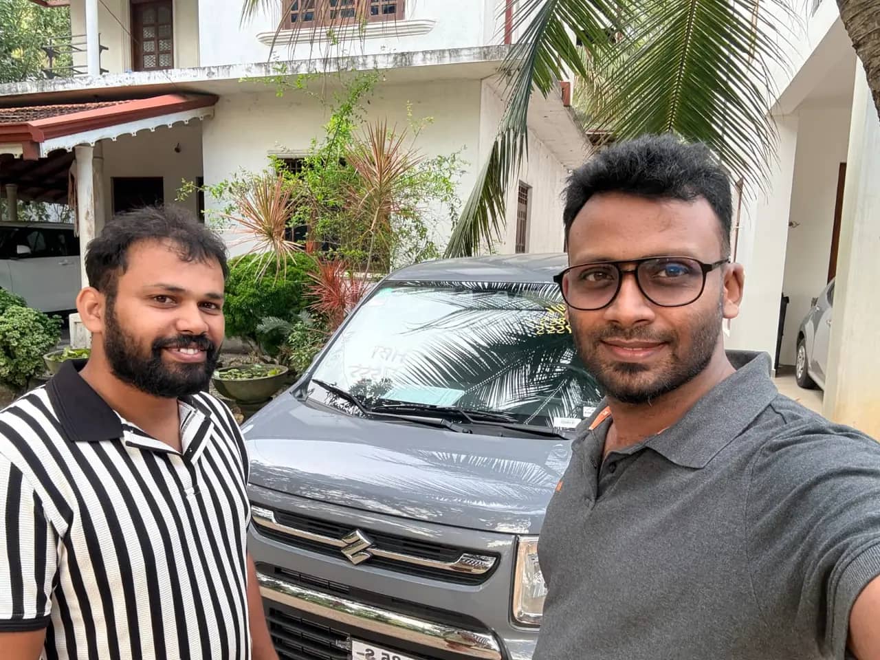 Genuine Automobiles customer with a delivered vehicle, photo 7