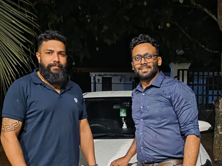 Genuine Automobiles customer with a delivered vehicle, photo 9