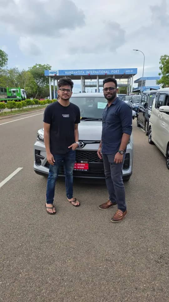 Genuine Automobiles customer with a delivered vehicle, photo 12