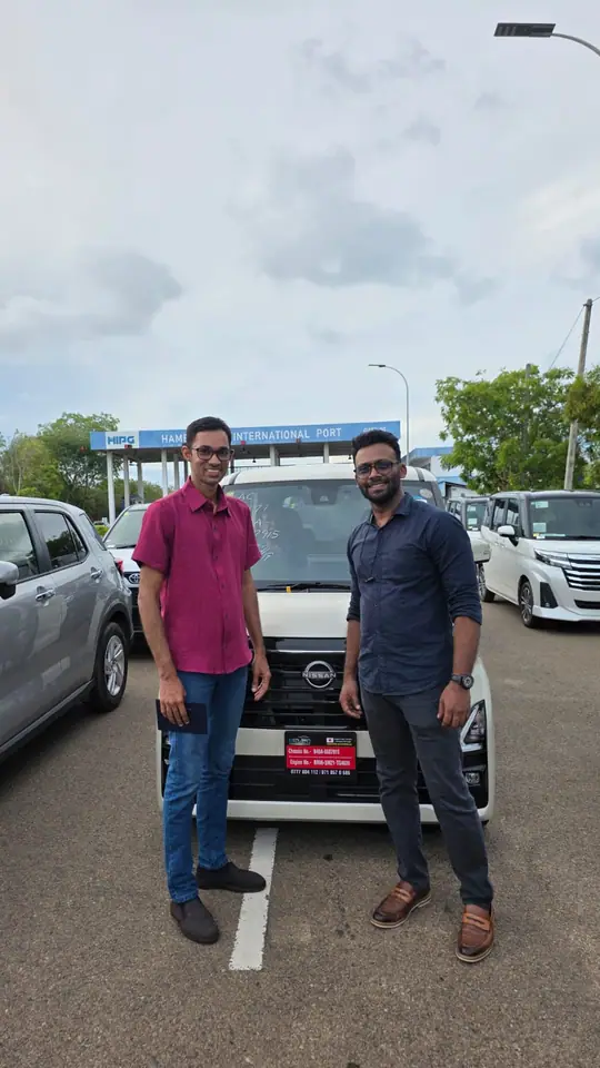 Genuine Automobiles customer with a delivered vehicle, photo 13