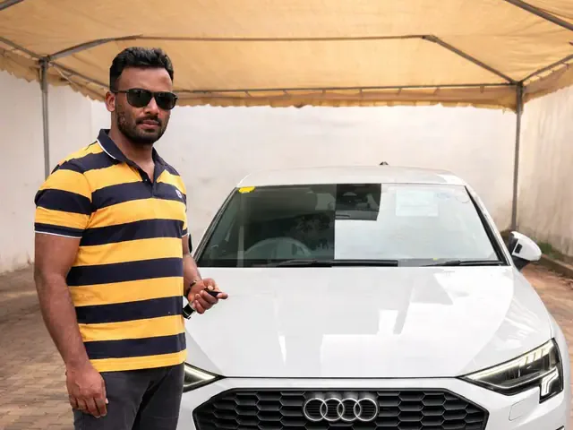 Genuine Automobiles customer with a delivered vehicle, photo 14