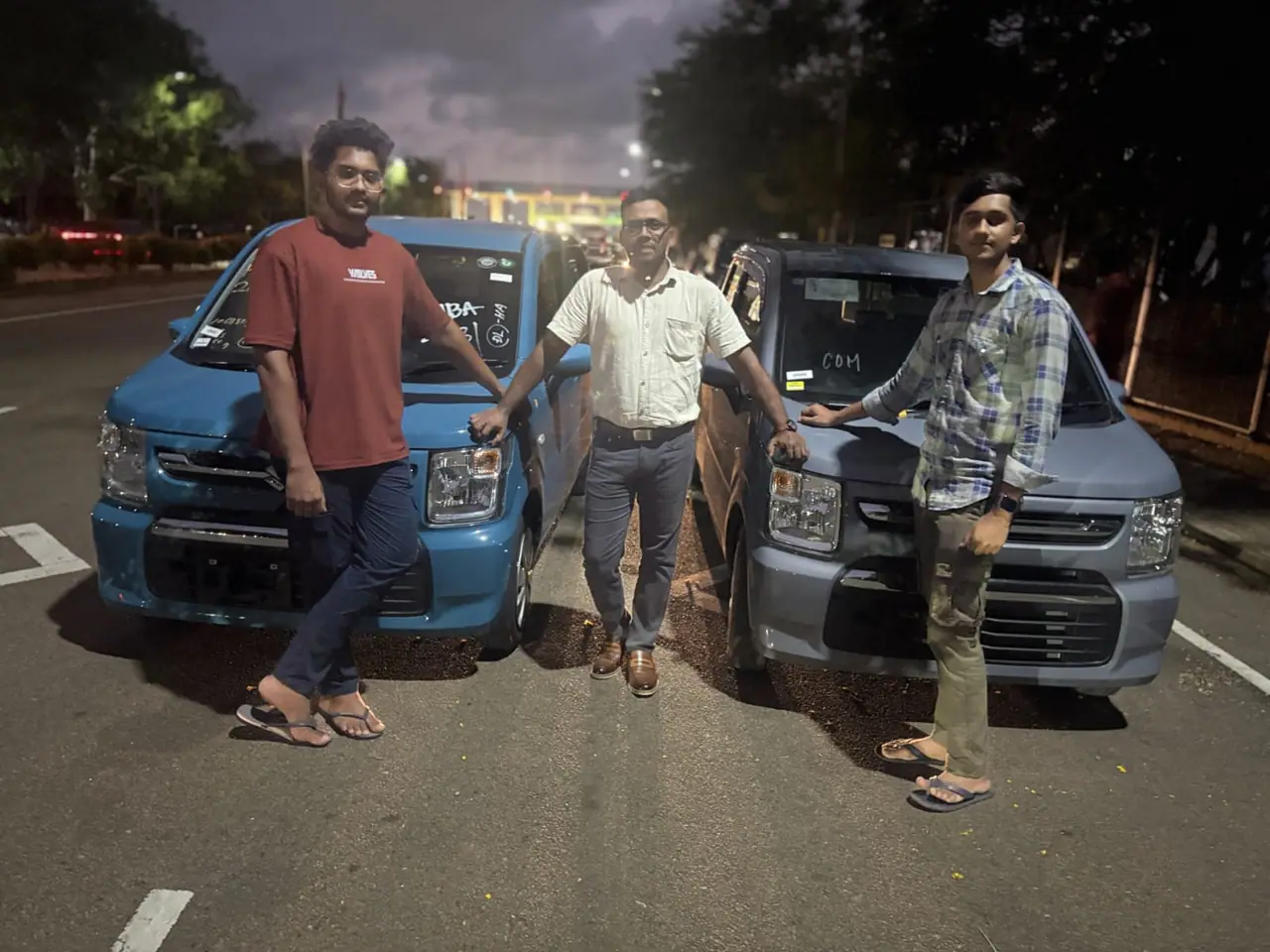 Genuine Automobiles customer with a delivered vehicle, photo 15