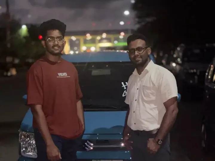 Genuine Automobiles customer with a delivered vehicle, photo 16