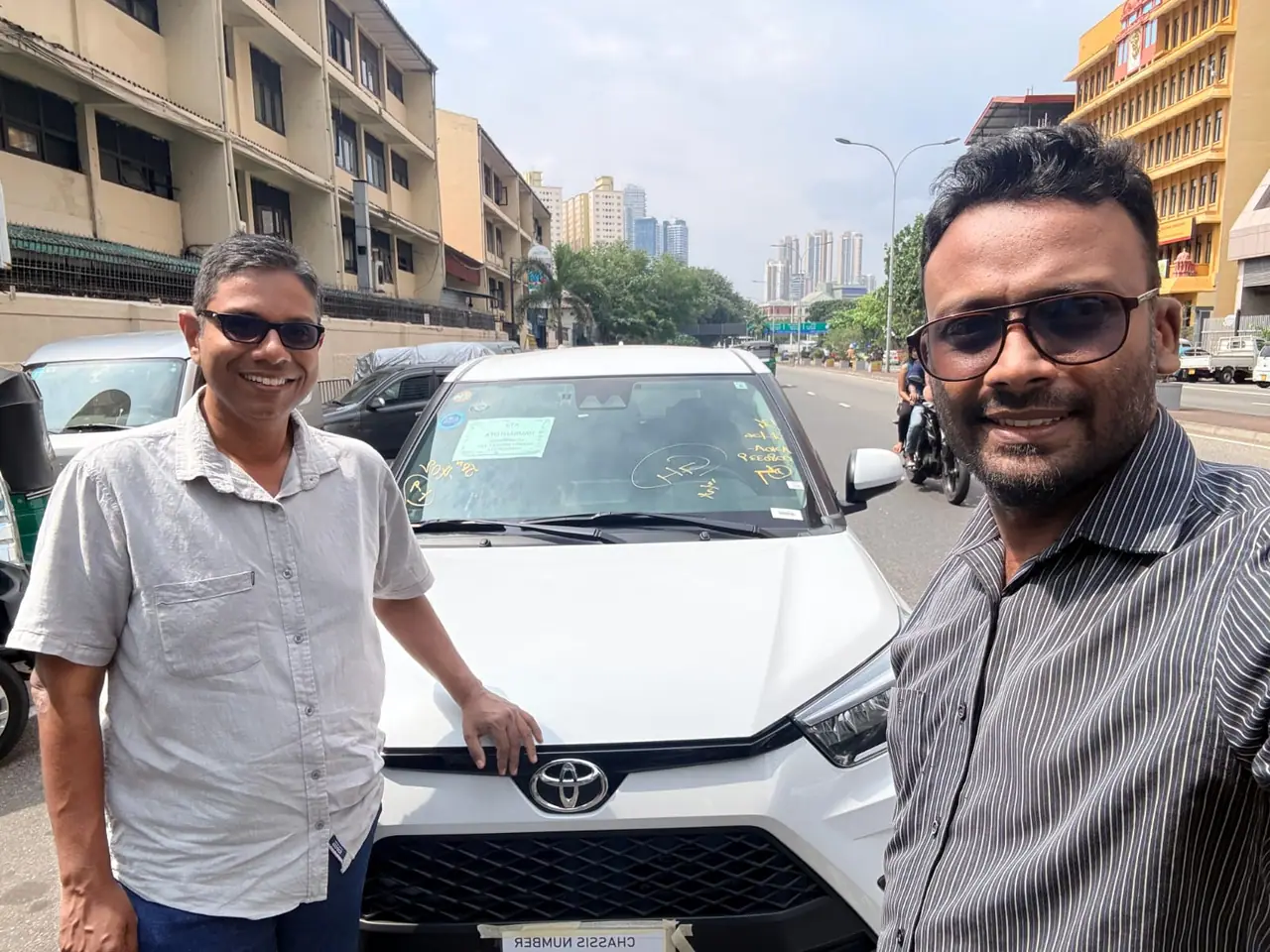 Genuine Automobiles customer with a delivered vehicle, photo 19