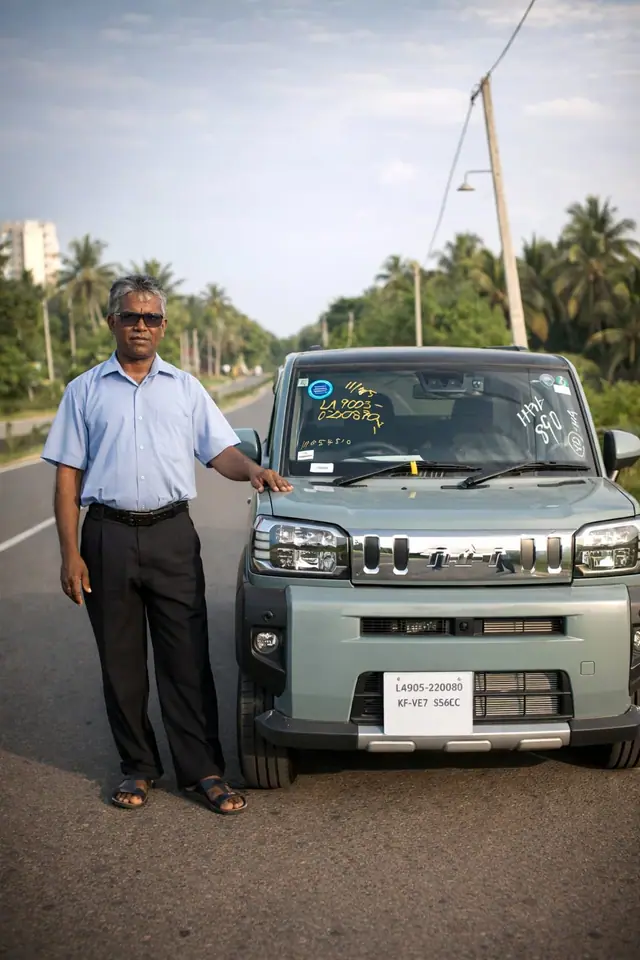 Genuine Automobiles customer with a delivered vehicle, photo 22