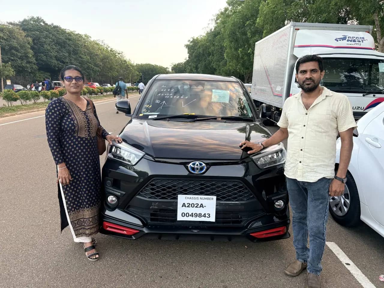 Genuine Automobiles customer with a delivered vehicle, photo 26