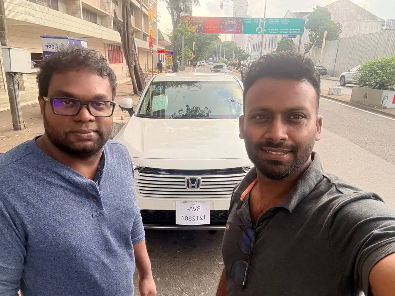 Genuine Automobiles customer with a delivered vehicle, photo 28