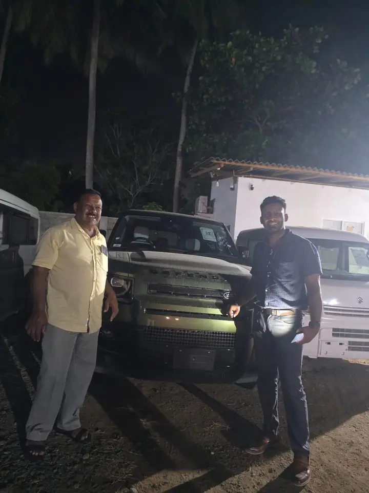 Genuine Automobiles customer with a delivered vehicle, photo 32