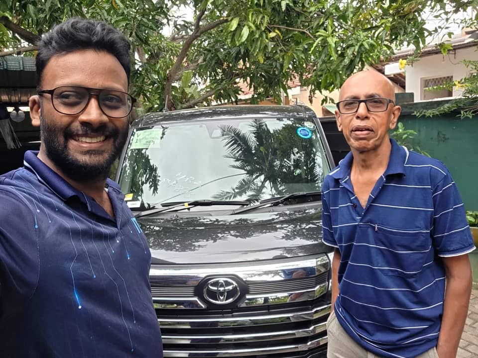 Genuine Automobiles customer with a delivered vehicle, photo 1